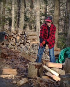 Aunt Bee chopping firewood by hand