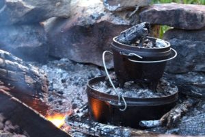 Cast iron cooking over a fire