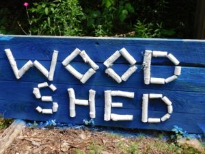 The Wood Shed sign near Shy Beaver Boat Launch