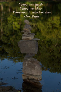 Rock statue at the homestead pond with our quote of the day