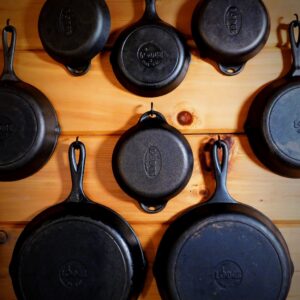 Cast Iron hung on the log walls.